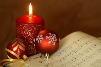 Christmas Candle and Sheet Music